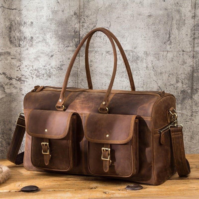 Braune Reisetasche Aus Leder Im Vintage-stil